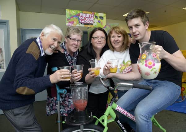 Shopmobility shop on Somerset Terrace Scarborough Launch of the Fruits of Yor Labour in aid of Shopmobility. PA1603-12c Pictured with the Smoothie Bike Bill Whittles (chairman), Eleanor Gabriel (trustee), Kelly Bennett (project co-ordinator), Wendy Smith (manager), Dan Hargraves (from Hedge-Hoggers  Cider)