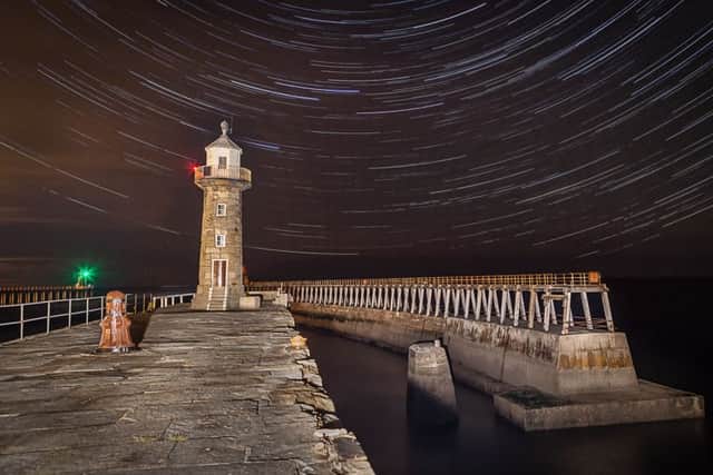 Star trails at Whitby Pier. Picture by Mark Bulmer.