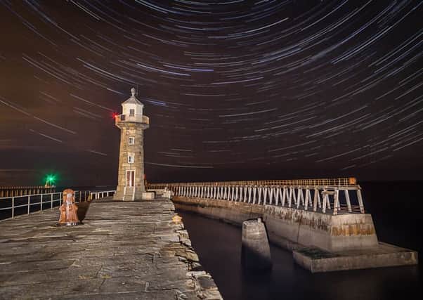 Star trails at Whitby Pier. Picture by Mark Bulmer.