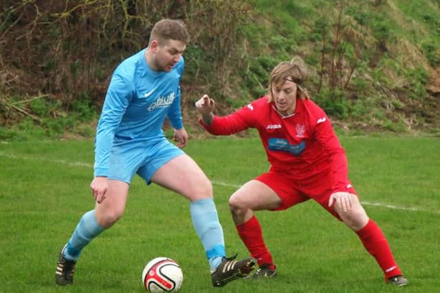 Trafalgar's Billy Logan, blue kit, scored the winning goal in his side's Kenward Cup win over Newlands. Picture: Steve Lilly