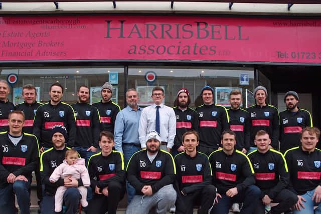Scalby's players line up with sponsors Mark Shields and Karl Goulding from estate agents Harris Bell Associates. Picture: Steve Lilly