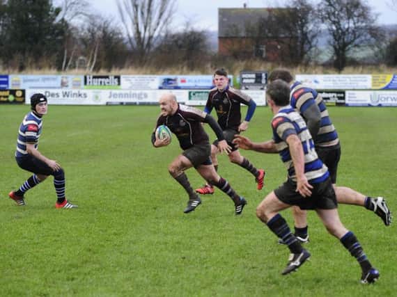 Phil Stewart ploughs forward in typically aggressive fashion. Picture: Andy Standing