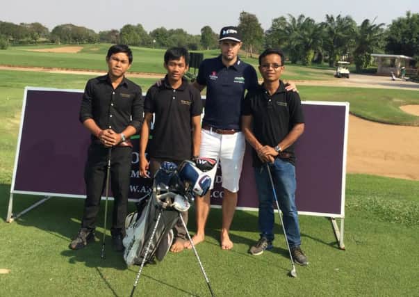 As well as working on his own game in Cambodia, Alex Belt is coaching staff and resort guests.
