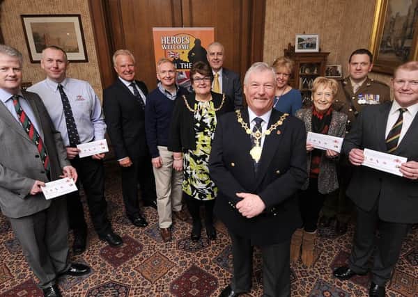 Charity Night Before the Colours  Cheque presentation at the Town Hall. Mayor Tom Fox thanks the recipients. David O'Kelly from Yorkshire Regiment Dave Horsley Rnli , John Senior ,Spons John Easby Kudos/HQ Hospitality ,Ros Fox, Nigel Wood Peace of Mind Financial solutions,Tom,Irene Webster ,Beryl Anderson Poppy Appeal,  Capt Billy Kelly Royal Dragoon Guards. pic Richard Ponter 160616