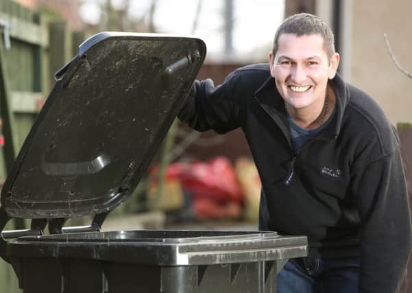 Ian Dowson, 50, from Whitby who is selling his wheelie bin on eBay for Â£10 after the council began charging for collections. February 15 2016, See Ross Parry copy RPYBIN A vexed resident is flogging his own recycling bin on eBay after tight-fisted council bosses asked him to pay EXTRA for the collection of garden waste. Ian Dowson, 50, an oil worker, bought the bin from Scarborough Borough Council three years ago for a one-off payment of #20 - but now the local authority are charging residents an annual payment of #36 for them to provide the same service. And now gutsy Ian wants to get ahead of the tide and sell his large plastic wheelie bin online so he can get his money back.