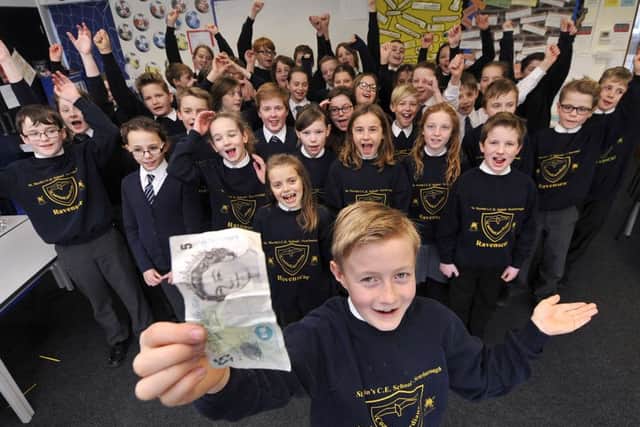 St Martins School. Five pound charity pupils are delighted with their big thank you nomination.  . James Grieve leads the group. . pic Richard Ponter 160804