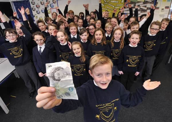 St Martins School. Five pound charity pupils are delighted with their big thank you nomination.  . James Grieve leads the group. . pic Richard Ponter 160804