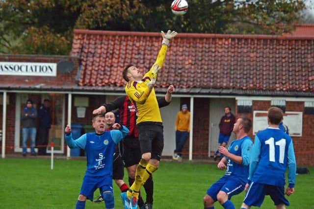 Ayton keeper Shaun Dolan (above) could be a key man in their trip to Cayton Reserves