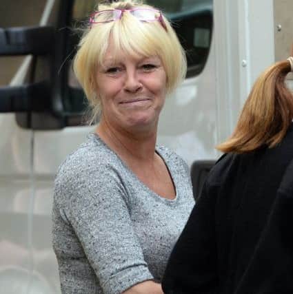 File picture shows Jayne Bladen appearing at York Crown court for arson and endangring life at Cayton Bay holiday park near Scarborough. A WOMAN torched her ex-lovers caravan with him in it before writing on Facebook: F****** hot tonight, a court heard yesterday. Jayne Bladen, 47, was said to be furious after Norman Terrell, 51, dumped her for cheating on him. She was arrested after her post was seen by a woman who helped fight the blaze at the caravan park near Scarborough, North Yorks. Mr Terrell told York crown court she was besotted and just would not let go. Bladen, of Scarborough, denies arson with intent to endanger life.