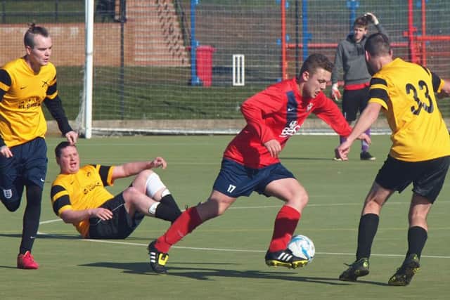 Ayton (red) go on the attack during their demolition of Alma. Pictures: Steve Lilly
