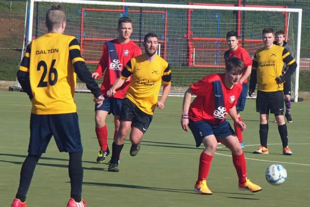 Alma close down an Ayton attack