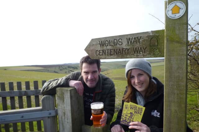 Malcolm Hodgson and Kate Mellor enjoy a pint of Wolds Way above Fordon