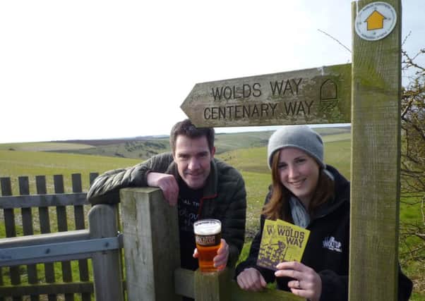 Malcolm Hodgson and Kate Mellor enjoy a pint of Wolds Way above Fordon