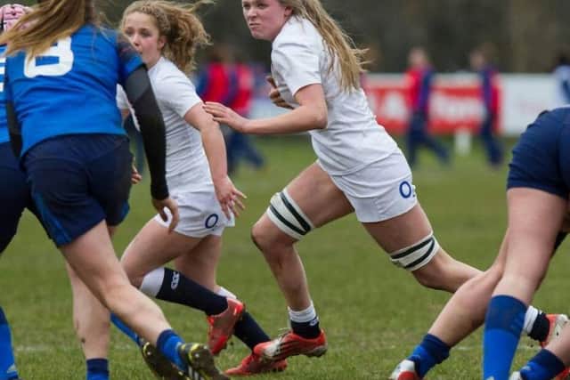Zoe Aldcroft gets on the ball during England's 25-25 draw with France on Saturday