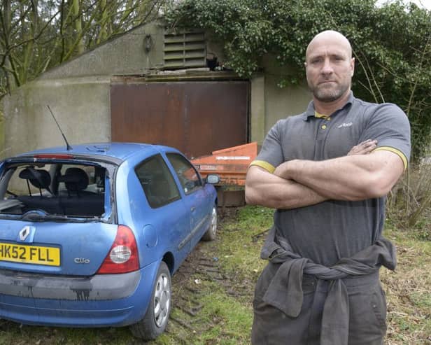 David Parker outside the storage area were the car was stolen. NBFP PA1611-4