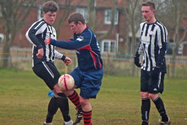 Sherburn (black and white) beat Eastway Sports in their Frank White Trophy semi-final showdown. Picture: Steve Lilly.