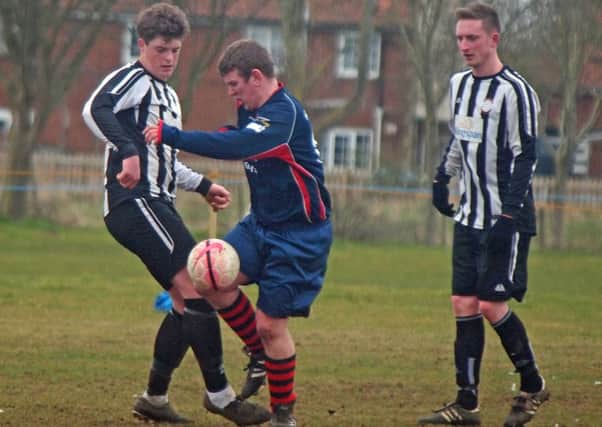 Sherburn (black and white) beat Eastway Sports in their Frank White Trophy semi-final showdown. Picture: Steve Lilly.