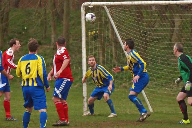 Cam Dobson heads in Hunmanby's first goal to make it 1-1 at home to Seamer, Hunmanby eventually winning 4-3