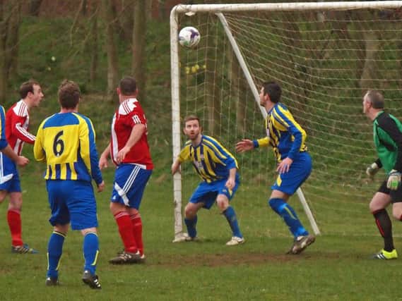 Cam Dobson heads in Hunmanby's first goal to make it 1-1 at home to Seamer, Hunmanby eventually winning 4-3