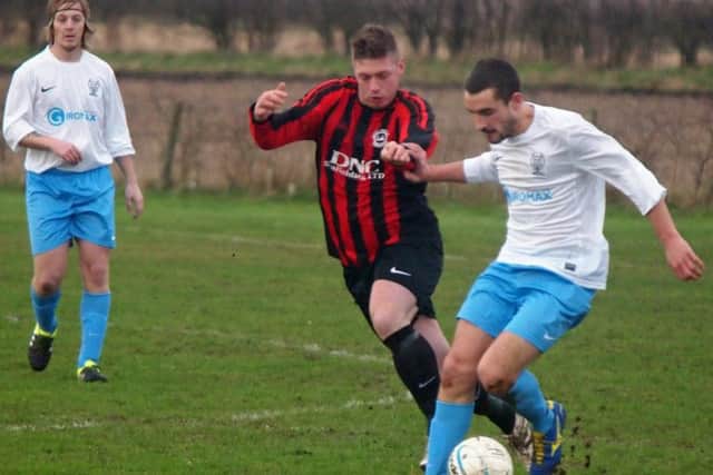 Will Jenkinson (red and black kit) scored a header as West Pier battled back from 4-1 down to draw 4-4 at Edgehill