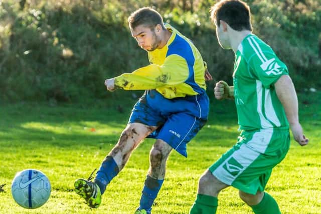 Wayne Shaw (yellow) had a hand in Rosette's second goal in their 4-3 win at Filey Town Thirds