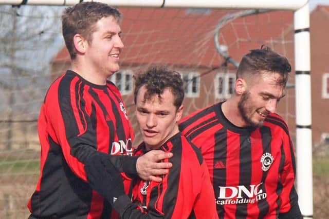 Billy Logan, left, has scored 44 goals in 22 games for Pier this season