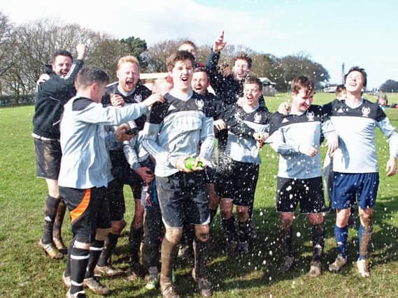 Newlands Reserves celebrate their second division title win