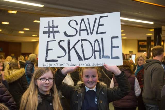 Children fight to save their school