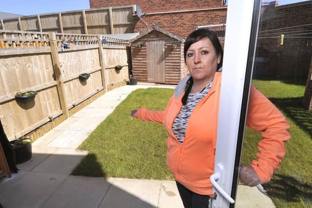 Marie Fretwell at her Middle Deepdale property viewing the poorly drained garden . pic Richard Ponter 161705a