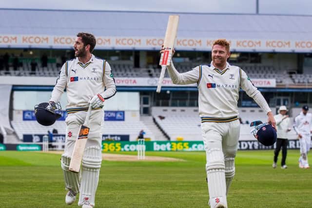 Yorkshire's Jonny Bairstow, right, celebrates his double century as he and Liam Plunkett walk off for the lunch interval on day two against Hampshire. Picture: Alex Whitehead/SWpix.com
