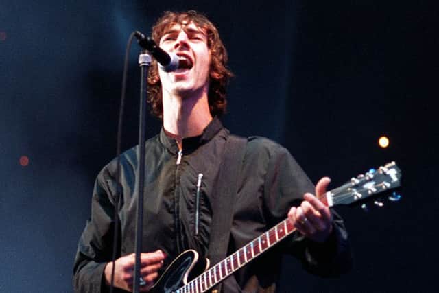 The Verve's lead singer Richard Ashcroft live in front of a home crowd at Haigh Hall in Wigan.