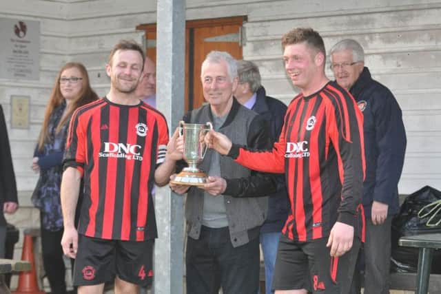 Pier's Gary Thomas & Will Jenkinson collect the trophy from former winner Pete Chapman