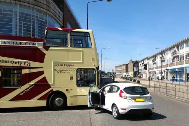 Crash between a car and bus