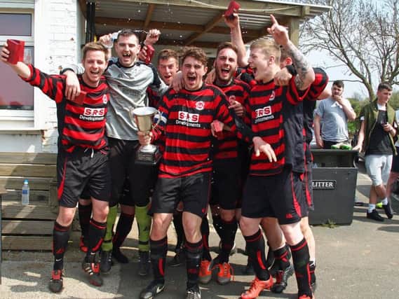 The West Pier lads celebrate their 3-2 Senior Cup final win against Traf 152187