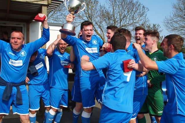 Cayton Corinthians celebrate after winning the Goal Sports Trophy. Picture: Steve Lilly