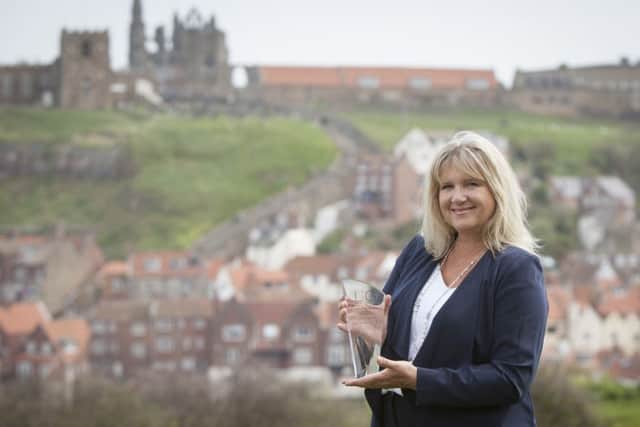 Susan Goss-Clements, with the luxury Accommodation Specialist of the Year award won by Whitby-based Yorkshire Coastal Cottages