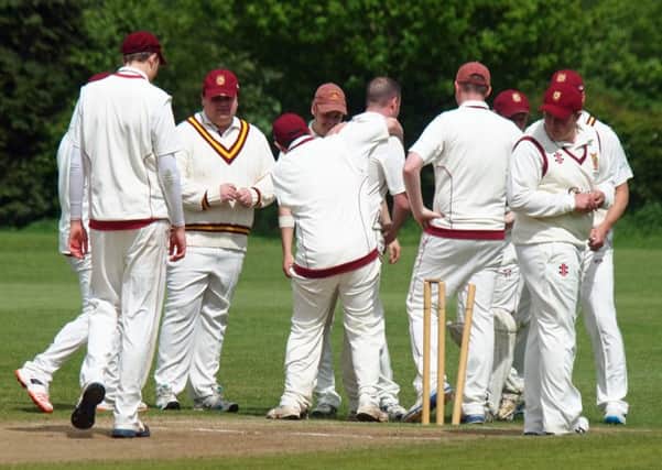 Staxton 2nds celebrate a wicket during their Division One clash with Wold Newton. Picture: Steve Lilly