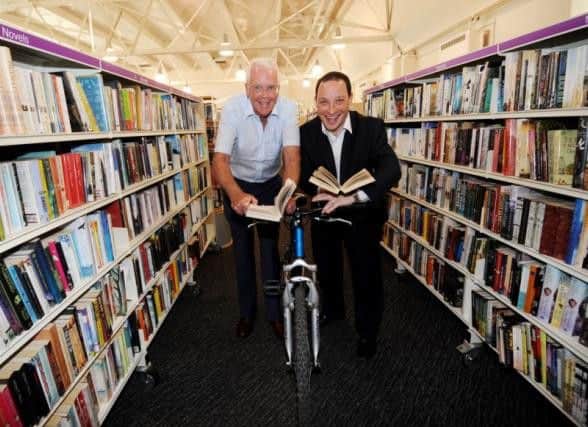 Couns Neil Buckley (left) and Dan Cohen at the Moor Allerton Bike Library. Picture by Simon Hulme.