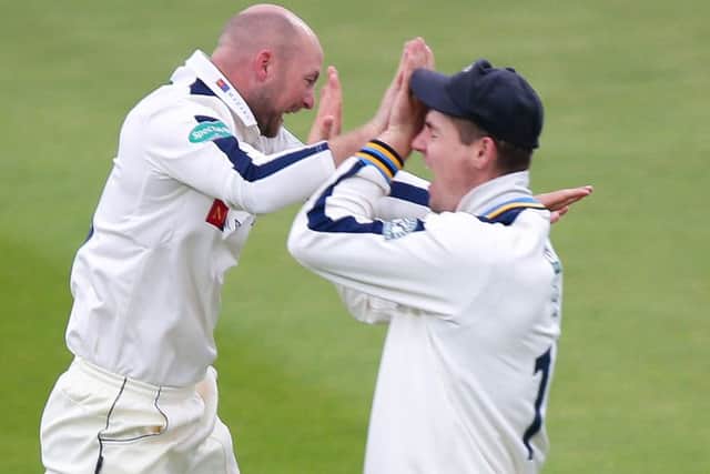 Yorkshire's Adam Lyth celebrates with Alex Lees the wicket of Lancashire's Luke Procter.