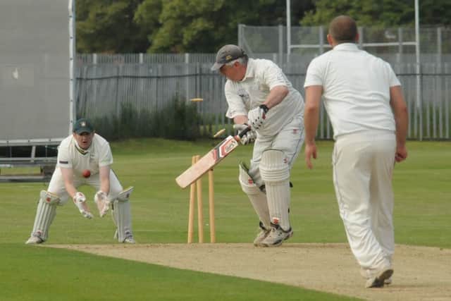 Bridlington 2nds' Mike Tate bowls a Fylingdales during his side's Division Two victory