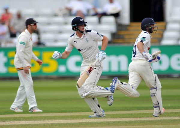 dam Lyth, right, and Alex Lees keep their eyes on the fielder as they take a quick run for Yorkshire against Durham yesterday (Picture: Frank Reid).