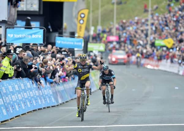 Thomas Voeckler, Direct Energie, crosses the finish line in Scarborough's North Bay to win the stage and take the overall honours from Team Sky's Nico Roche.
Tour de Yorkshire Stage 3.  Middlesborough to Scarborough.  1 May 2016.  Picture Bruce Rollinson