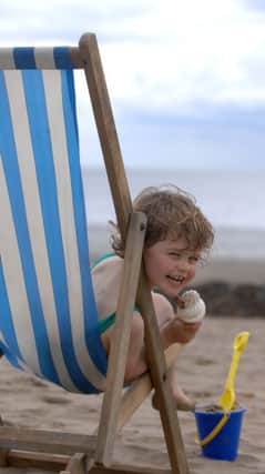 22nd  May 2009.
Weather Picture for Bank Holiday weekend.
Pictured 4 year old Connie Barker from Borough Bridge takes advantage of a teacher training day to enjoy an icecream on the South Bay Beach at Scarborough on a day visit to the coast.
Picture by Gerard Binks