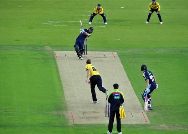 Adam Lyth smashes a huge six of ther bowling of Rikki Clarke. Picture SWpix.com