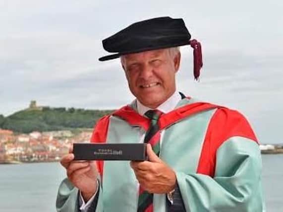 John Senior MBE TD has received an honorary degree