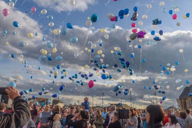 Balloon release and vigil at the entrance to Seaham Marina  in memory of Megan Bell who died at T in the Park festival.