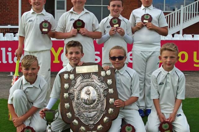 Cayton Primary School line up with their Primary Schools Hardball Cup silverware 	                  Pictures: Steve Lilly