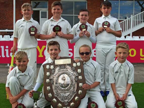 Cayton Primary School line up with their Primary Schools Hardball Cup silverware 	                  Pictures: Steve Lilly