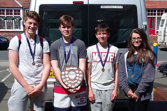 Some of the Filey Sea Cadets show their medal and trophy haul following the successful regatta