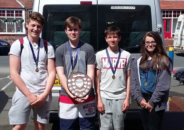 Some of the Filey Sea Cadets show their medal and trophy haul following the successful regatta